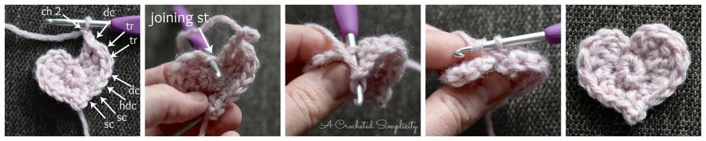 Hand holding small pink crochet heart.