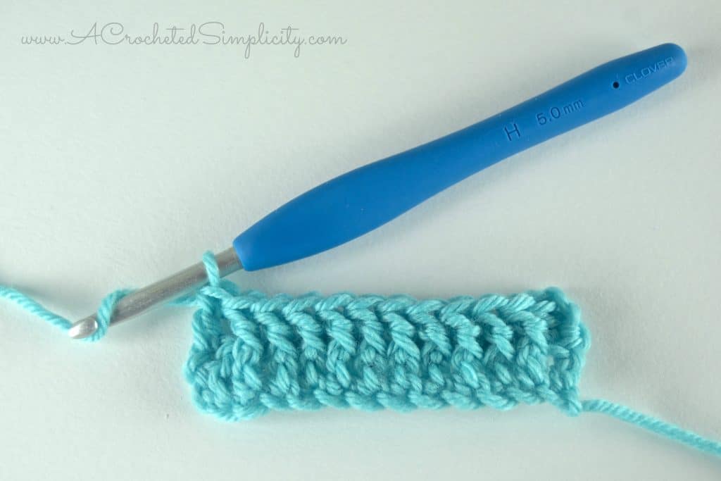 Learn How to Crochet the Front Post Double Crochet Stitch - Photo & Video Tutorial by A Crocheted Simplicity #freecrochettutorial #frontpostdoublecrochet #crochetstitches #crochetstitchtutorial #crochetcablestitch