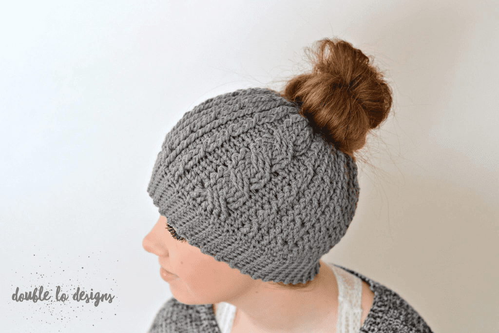 Free Crochet Pattern - Crochet Cabled Messy Bun Hat (Adult Sizes) (video tutorial included) by A Crocheted Simplicity