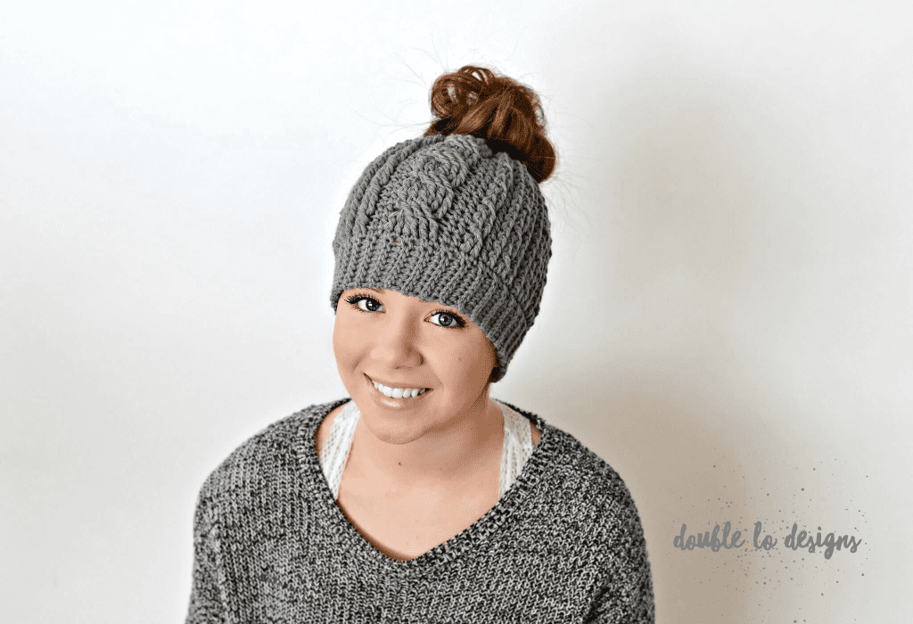 Free Crochet Pattern - Crochet Cabled Messy Bun Hat (Adult Sizes) (video tutorial included) by A Crocheted Simplicity