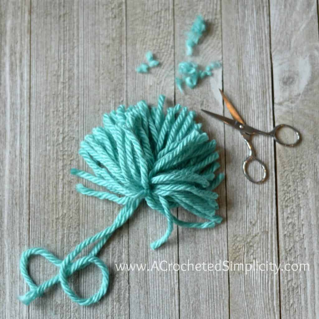 Floppy Yarn Pom Tutorial by A Crocheted Simplicity