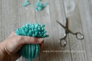 Floppy Yarn Pom Tutorial by A Crocheted Simplicity