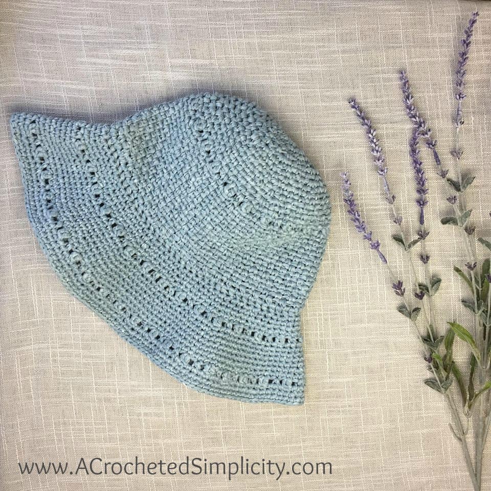 Free Crochet Pattern - Stop & Rewind Sunhat by A Crocheted Simplicity Sizes Included: Doll through Adult Large. #freecrochetsunhatpattern #freecrochethatpattern #freecrochetpattern #crochetsunhat #crochetsummerhat #crochetforsummer #handmadehat