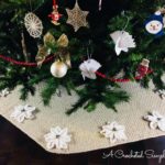 Free Crochet Pattern - Poinsettia Tree Skirt by A Crocheted Simplicity #crochet #crochettreeskirt #christmastreeskirt #crochetpoinsettia