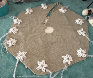 Free Crochet Pattern - Poinsettia Tree Skirt by A Crocheted Simplicity #crochet #crochettreeskirt #christmastreeskirt #crochetpoinsettia