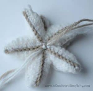 Free Crochet Pattern - Poinsettia Tree Skirt by A Crocheted Simplicity #crochet #crochettreeskirt #christmastreeskirt #crochetpoinsettia