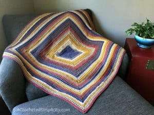 Centaur Mandala Afghan - Free Crochet Blanket Pattern by A Crocheted Simplicity#freecrochetpattern #freecrochetblanketpattern #crochetafghan #lionbrandmandalablanket #freecrochetlapghanpattern