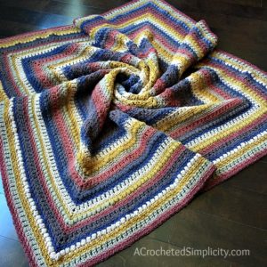 Centaur Mandala Afghan - Free Crochet Blanket Pattern by A Crocheted Simplicity#freecrochetpattern #freecrochetblanketpattern #crochetafghan #lionbrandmandalablanket #freecrochetlapghanpattern