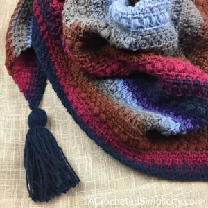 Free Crochet Pattern - Griffin Shawl / Triangular Scarf by A Crocheted Simplicity #crochet #freecrochetshawlpattern #freecrochetpattern #freecrochetscarf #triangularscarfpattern #lionbrandmandala #crochetshawl #crochetscarf #crochetshawlpattern #crochettriangularshawl