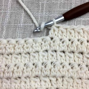 Learn to Crochet the 2 Double Crochet Cluster Stitch - Crochet Tutorial by A Crocheted Simplicity #crochetstitchtutorial #chainlesscrochetstitch #crochetclusterstitch #doublecrochetcluster #freecrochettutorial