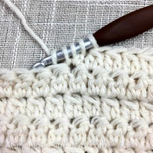 Learn to Crochet the 2 Double Crochet Cluster Stitch - Crochet Tutorial by A Crocheted Simplicity #crochetstitchtutorial #chainlesscrochetstitch #crochetclusterstitch #doublecrochetcluster #freecrochettutorial