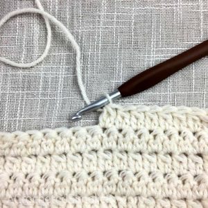 Learn to Crochet the 2 Double Crochet Cluster Stitch - Crochet Tutorial by A Crocheted Simplicity #crochetstitchtutorial #chainlesscrochetstitch #crochetclusterstitch #doublecrochetcluster #freecrochettutorial