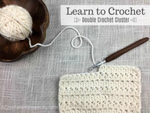 Learn to Crochet the 2 Double Crochet Cluster Stitch - Crochet Tutorial by A Crocheted Simplicity #crochetstitchtutorial #chainlesscrochetstitch #crochetclusterstitch #doublecrochetcluster #freecrochettutorial