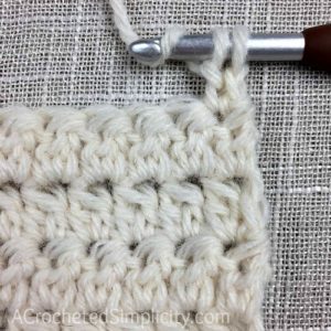 Learn to Crochet the Alternate Double Crochet Cluster Stitch - Crochet Tutorial by A Crocheted Simplicity #crochetstitchtutorial #chainlesscrochetstitch #crochetclusterstitch #doublecrochetcluster #freecrochettutorial