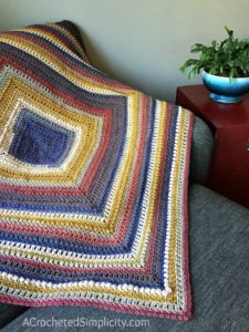 Centaur Mandala Afghan - Free Crochet Blanket Pattern by A Crocheted Simplicity#freecrochetpattern #freecrochetblanketpattern #crochetafghan #lionbrandmandalablanket #freecrochetlapghanpattern