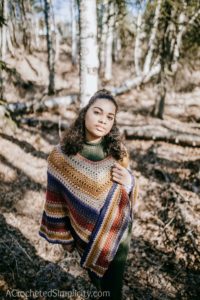 Free Crochet Pattern - Wasilla Poncho by A Crocheted Simplicity #freecrochetpattern #crochetponcho #crochet #womensponcho #lionbrandmandala #crochetponchopattern