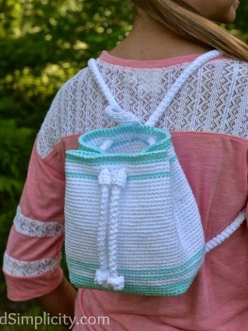 Free Crochet Pattern - Drawstring Mini-Backpack by A Crocheted Simpliciy #crochet #freecrochetpattern #crochetbackpack #minibackpack #drawstringbackpack