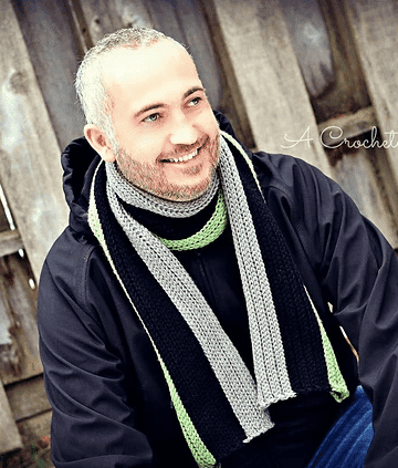 Men's crochet scarf in black, grey, and lime green.