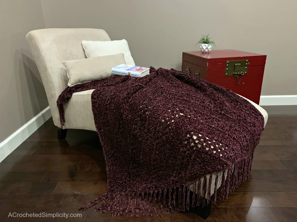 Aubergine Afghan - Free Crochet Blanket Pattern by A Crocheted Simplicity #freecrochetpattern #crochetblanketpattern #crochetafghanpattern #freecrochetblanketpattern #crochet #grannysquareblanket