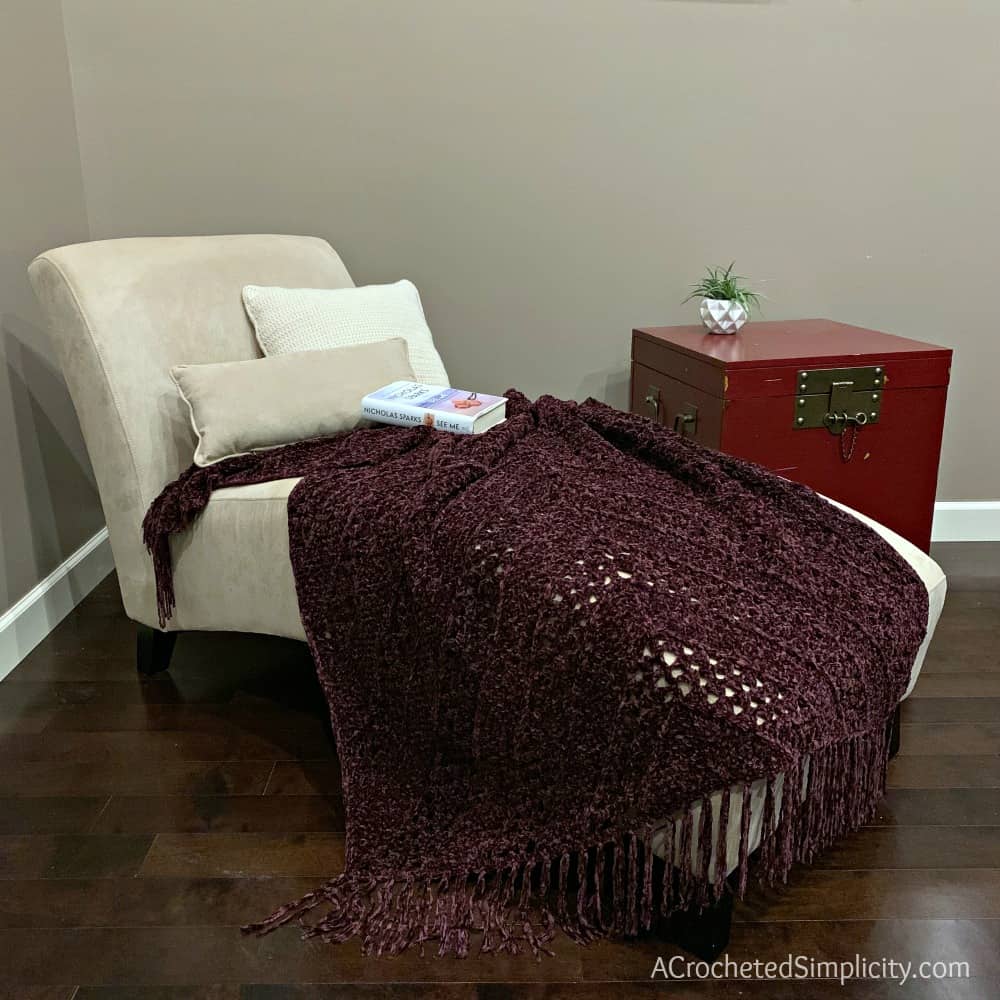 Aubergine Afghan - Free Crochet Blanket Pattern by A Crocheted Simplicity #freecrochetpattern #crochetblanketpattern #crochetafghanpattern #freecrochetblanketpattern #crochet #grannysquareblanket