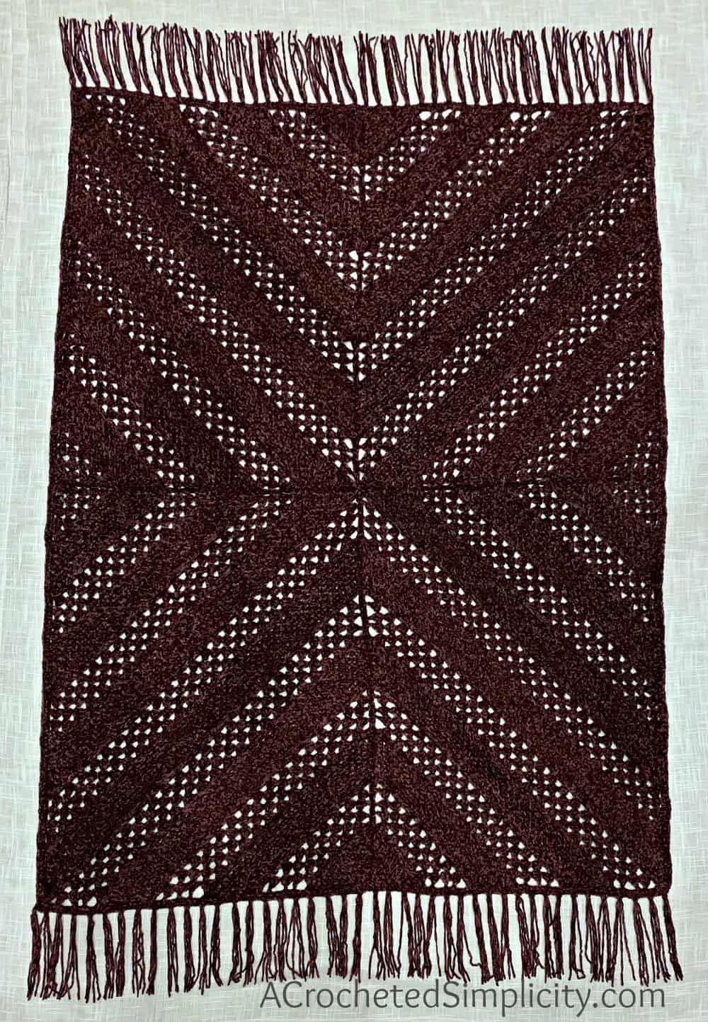 Aubergine Afghan - Free Crochet Blanket Pattern by A Crocheted Simplicity #freecrochetpattern #crochetblanketpattern #crochetafghanpattern #freecrochetblanketpattern #crochet #grannysquareblanket