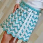 Crochet Skirt Pattern - Chasing Chevrons Girls Skirt by A Crocheted Simplicity #crochetskirt #crochetchevrons #chevrons #chevronskirt #crochetskirtpattern #girlsskirt #chevronskirt #crochetripple #girlsskirtpattern #handmadeskirt