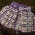 Crochet Skirt Pattern - Perfectly Plaid Girls Skirt by A Crocheted Simplicity #crochetskirt #crochetforgirls #pladiskirt #crochetplaid #crochetskirtpattern #handmadeskirt