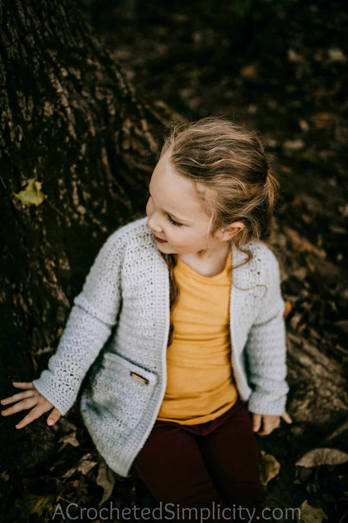 Free Crochet Cardigan Pattern - Aurora Cardigan for Girls by A Crocheted Simplicity #crochet #crochetcardigan #crochetcardiganpattern #freecrochetpattern #crochetsweater #crochetgirlscardigan #handmadecardigan #homemade