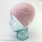 Free Crochet Beanie Pattern - Awareness Ribbon Beanie Crochet Pattern by A Crocheted Simplicity #freecrochetpattern #freecrochetbeaniepattern #crochetawarenesshat #awarenessribbon #awarenessribbonbeanie #cancerawarenessbeanie #chemocap #crochetchemocap #crochetcancerhat #raiseawareness
