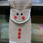 Free Crochet Pattern - Gingerbread Man Kitchen Towel by A Crocheted Simplicity #freecrochetpattern #crochetdishtowel #crochetteatowel #crochetkitchentowel #christmastowel #christmascrochet #gingerbreadman #crochetgingerbreadman