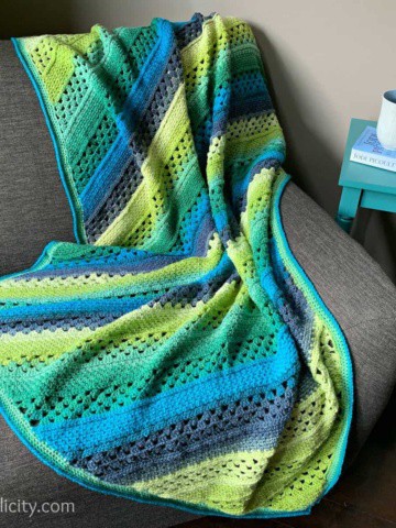 Free Crochet Blanket Pattern - On the Bias Rectangular Afghan by A Crocheted Simplicity #crochetblanket #crochetafghan #freecrochetpattern #freecrochetblanketpattern #handmadeblanket #homemade #lionbrandwooleasecakes