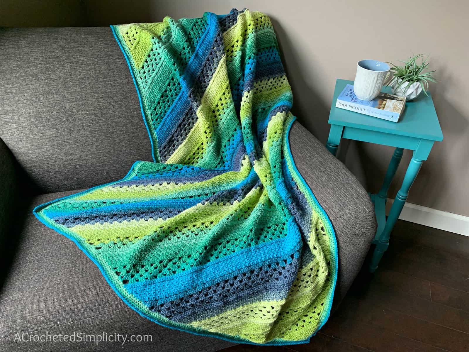 Free Crochet Blanket Pattern - On the Bias Rectangular Afghan by A Crocheted Simplicity #crochetblanket #crochetafghan #freecrochetpattern #freecrochetblanketpattern #handmadeblanket #homemade #lionbrandwooleasecakes