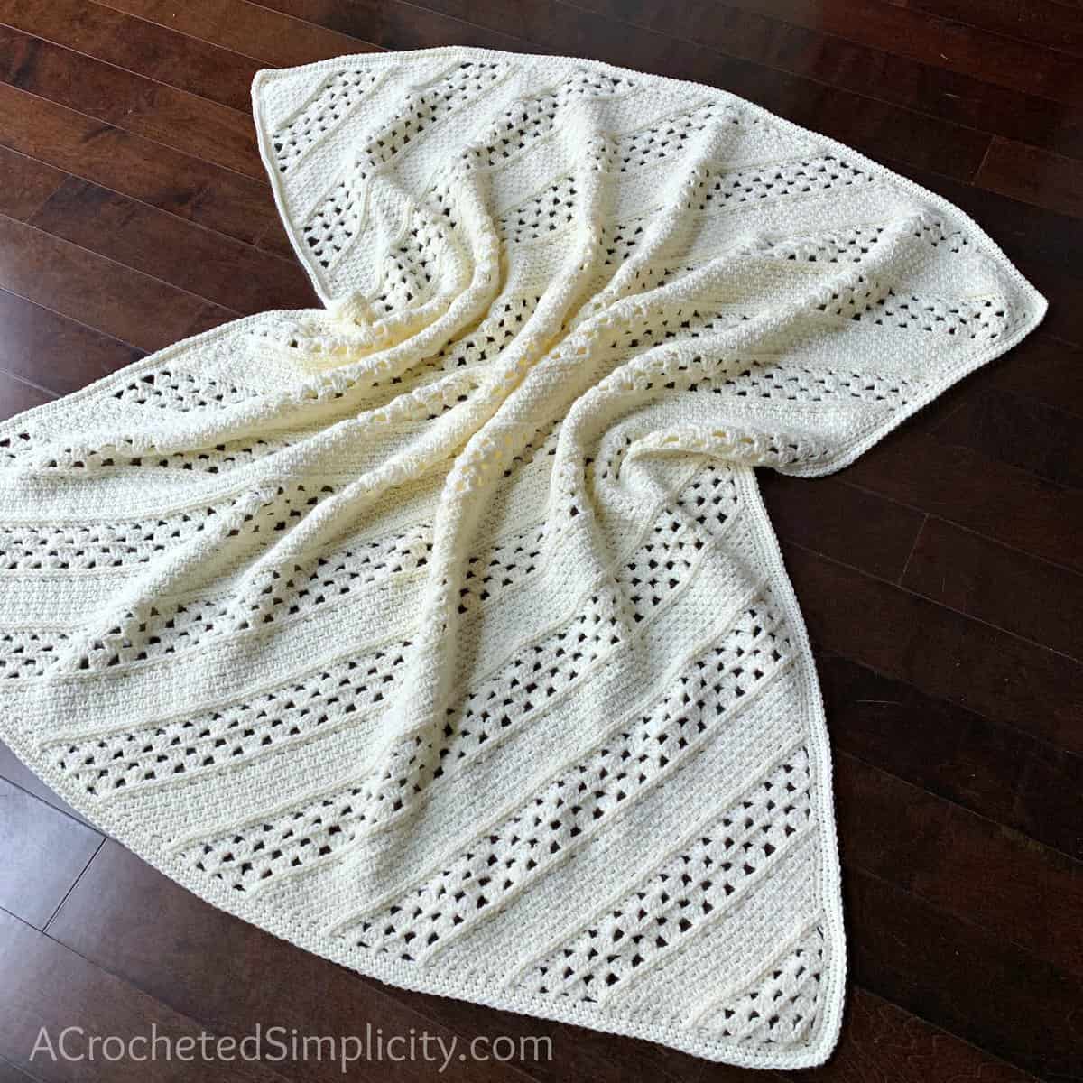 Free Crochet Blanket Pattern - On the Bias Square Afghan by A Crocheted Simplicity #crochetblanket #crochetafghan #freecrochetpattern #freecrochetblanketpattern #handmadeblanket #homemade #lionbrandwooleasecake