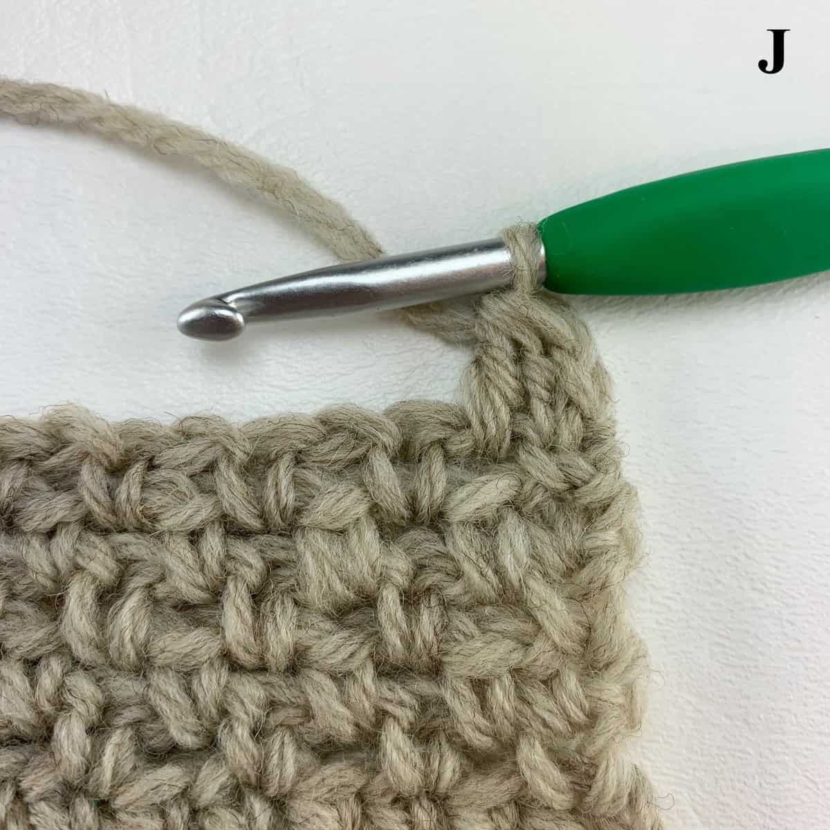 Learn to Crochet the Alternate Double Crochet Decrease, also know as a chainless double crochet - tutorial by A Crocheted Simplicity #crochetstitchtutorial #chainlessstitch #crochetstitchdecrease #alternatedoublecrochet