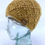 gold argyle messy bun hat side view