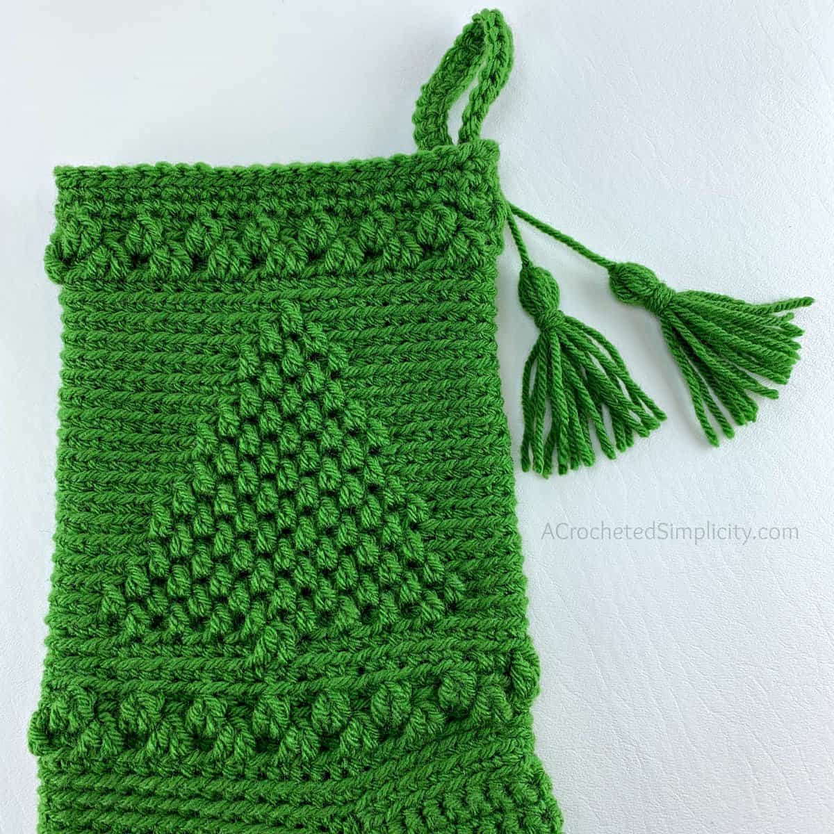 Free Crochet Pattern - O' Christmas Tree Christmas Stocking by A Crocheted Simplicity #freecrochetstockingpattern #freecrochetpattern #crochetchristmas #christmasstockingpattern #crochet #handmadestocking