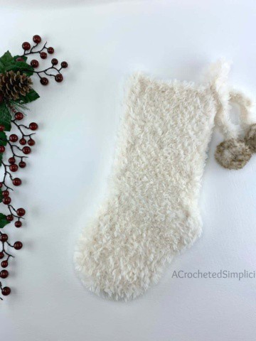 Free Crochet Pattern - Faux Fur Christmas Stocking by A Crocheted Simplicity#freecrochetstockingpattern #freecrochetpattern #crochetchristmas #christmasstockingpattern #crochet #handmadestocking