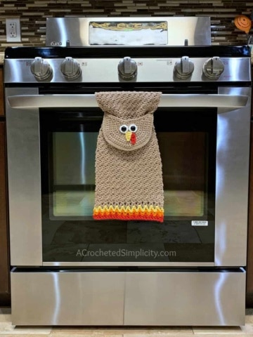 Free Crochet Pattern - Turkey Kitchen Towel by A Crocheted Simplicity . #turkey #crochettowel #crochettowelpattern #crochetdishtowel #crochet #freecrochetpattern #crochetturkey