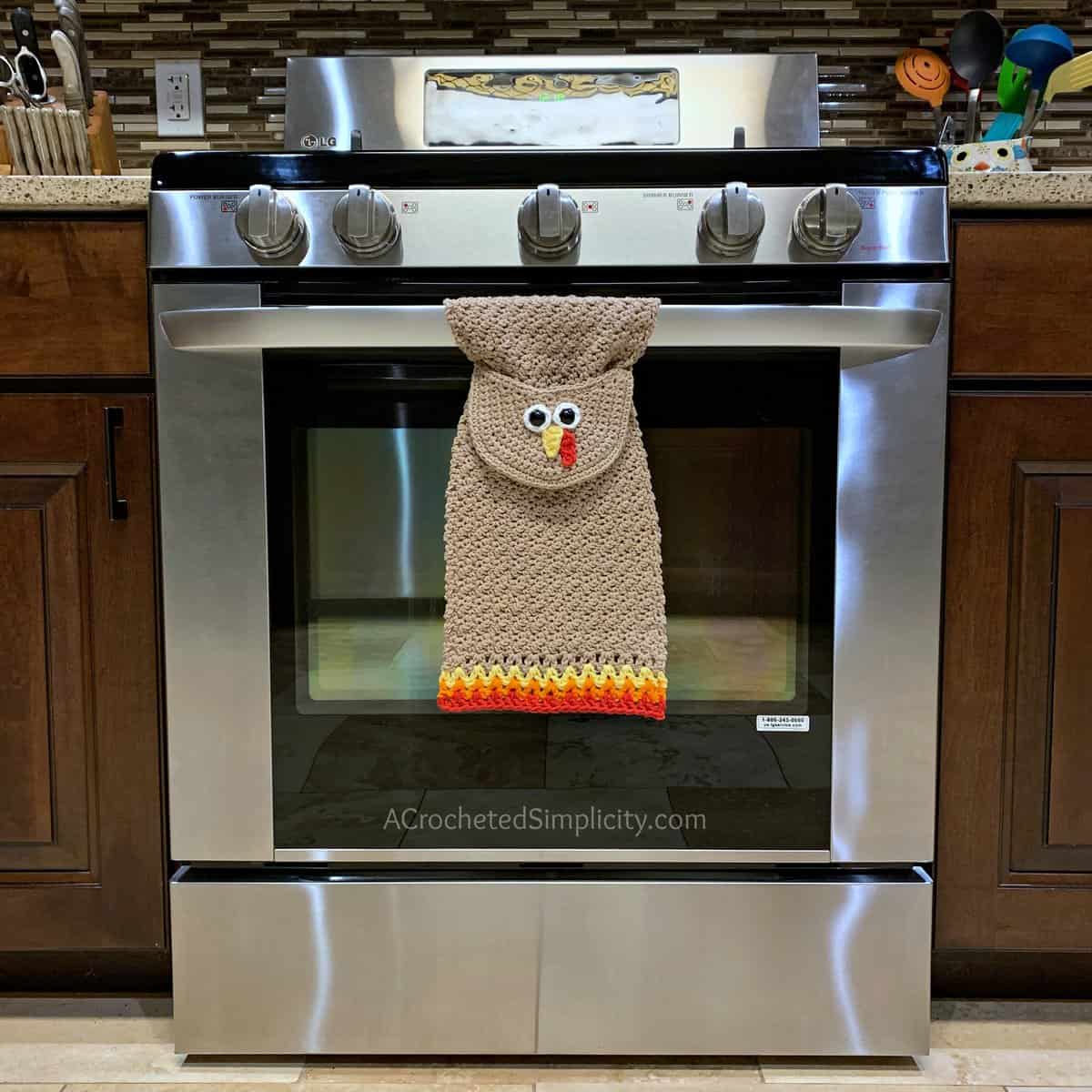 Free Crochet Pattern - Turkey Kitchen Towel by A Crocheted Simplicity . #turkey #crochettowel #crochettowelpattern #crochetdishtowel #crochet #freecrochetpattern #crochetturkey