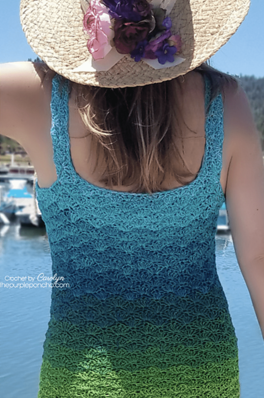 Woman wearing ombre crochet tank top.