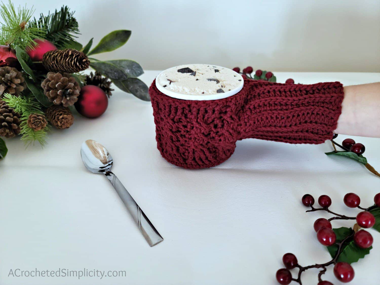 Free Crochet Drink Mitt Pattern - Cabled Sweater Ice Cream Cozy & Drink Mitt by A Crocheted Simplicity #freecrochetpattern #cozyholidaycal #crozydrinkmitt #crochetdrinkmittpattern #crochetcables