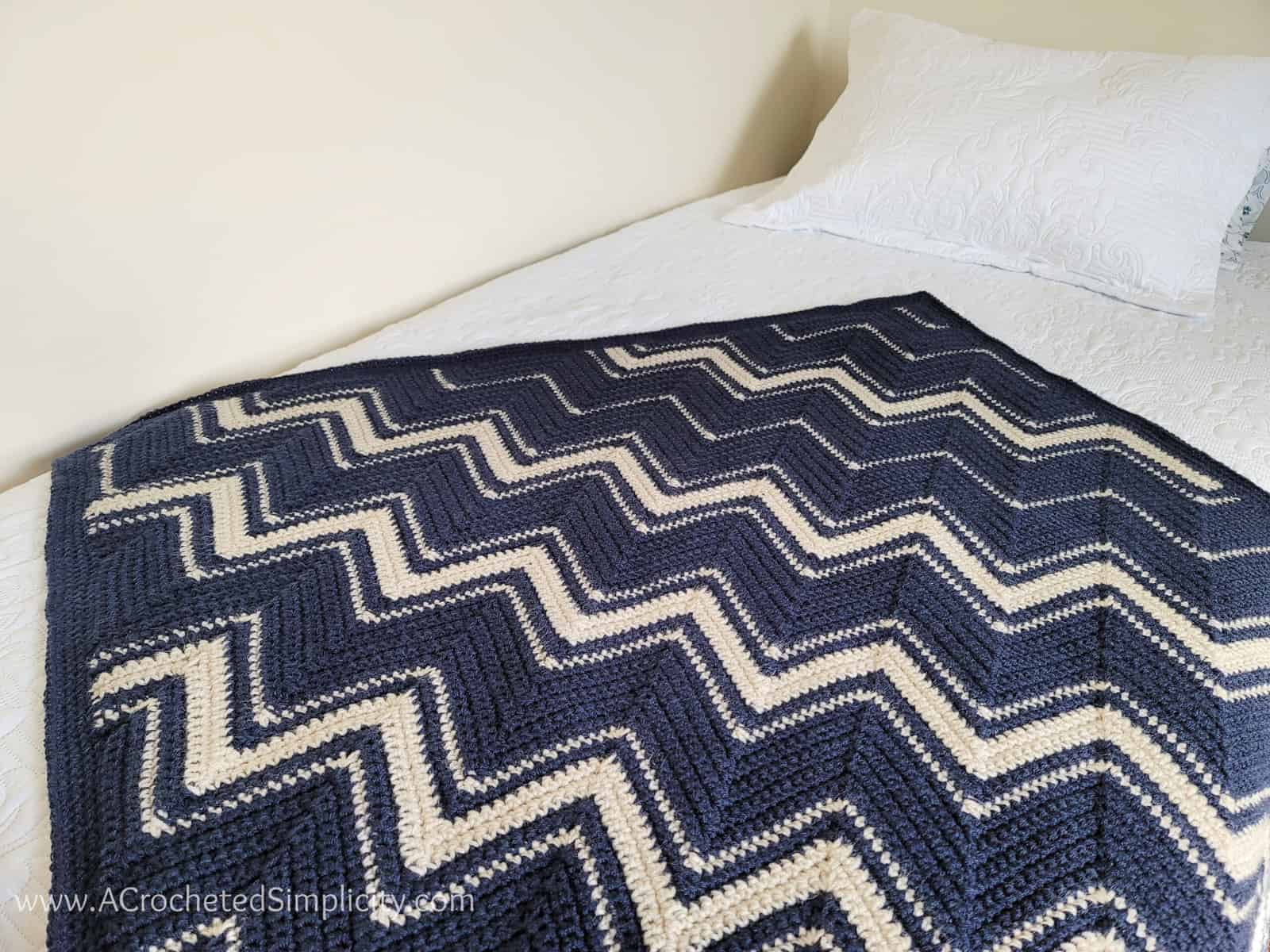 Free Crochet Blanket Pattern - Diagonal Chevron Lapghan by A Crocheted Simplicity #freecrochetpattern #freecrochetblanketpattern #crochetlapghanpattern #crochetblanketpattern #crochetrippleblanket #crochetchevronblanket #crochetchevron #c2ccrochet #cornertocornercrochet #crochetlapghan #crochetafghan