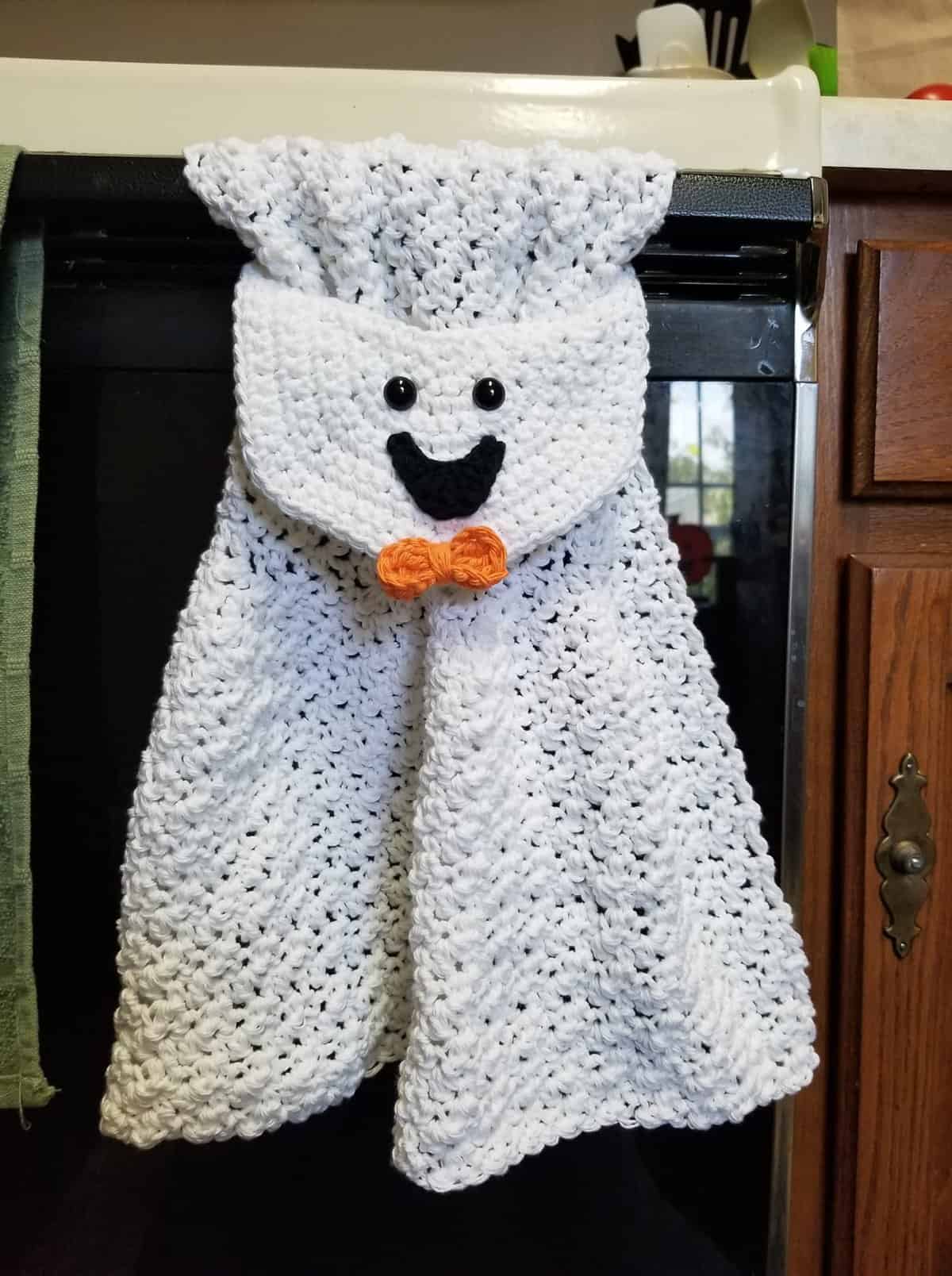 Free Crochet Towel Pattern - Ghost Towel by A Crocheted Simplicity #freecrochetpattern #crochetghost #crochetghostpattern #freecrochetghostpattern #crochet #crochettowel #crochettowelpattern #handmade #halloweentowel #ghosttowel