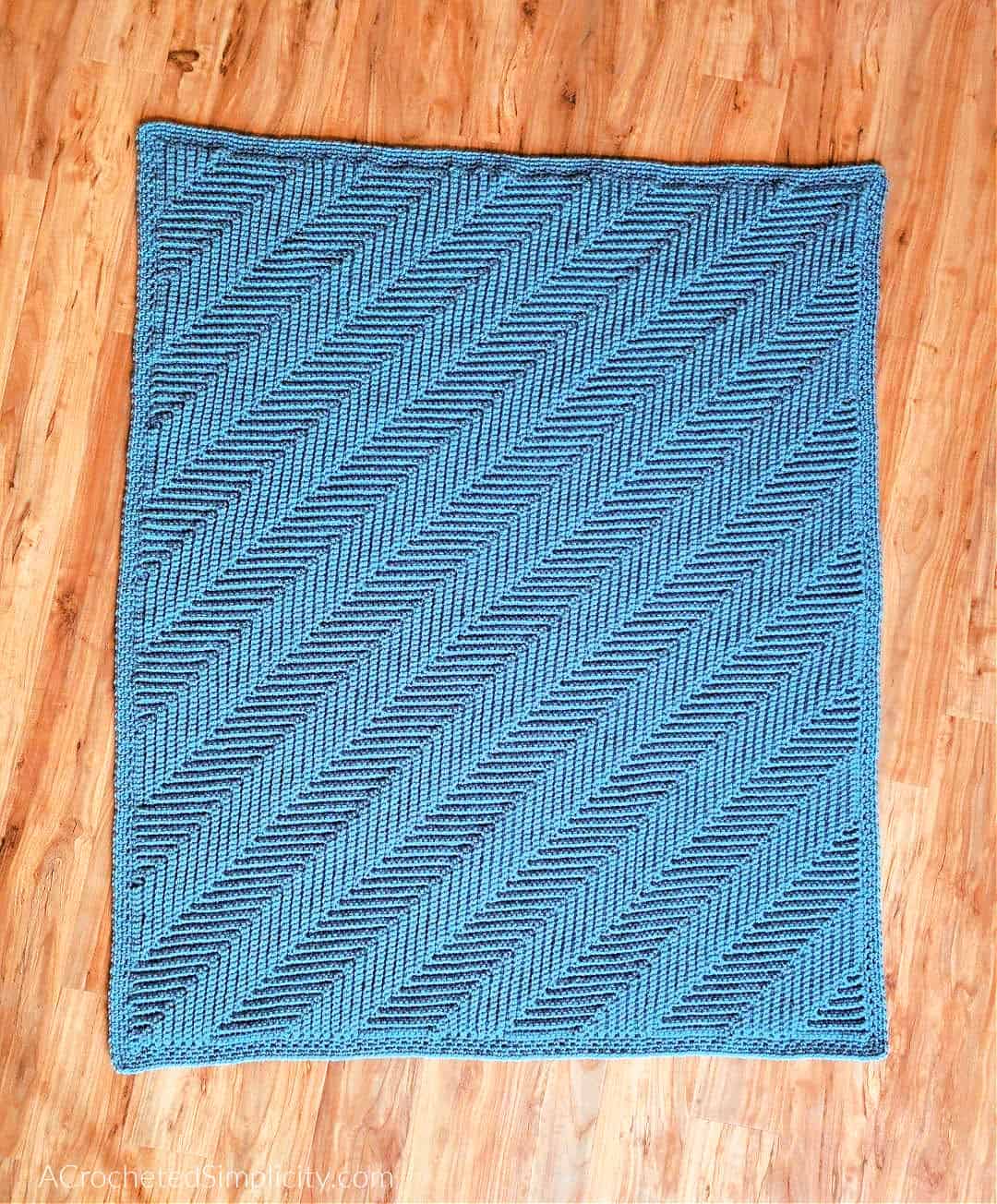 Free Crochet Blanket Pattern - Diagonal Ripple Lapghan by A Crocheted Simplicity #freecrochetpattern #freecrochetblanketpattern #crochetlapghanpattern #crochetblanketpattern #crochetrippleblanket #crochetchevronblanket #crochetchevron #c2ccrochet #cornertocornercrochet #crochetlapghan #crochetafghan