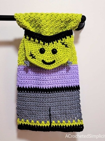 Free Crochet Towel Pattern - Frankenstein's Monster Kitchen Towel by A Crocheted Simplicity #freecrochetpattern #crochetmonster #crochetmonsterpattern #freecrochetfrankensteinpattern #crochet #crochettowel #crochettowelpattern #handmade #halloweentowel #frankensteintowel #frankensteincrochet #crochetfrankenstein