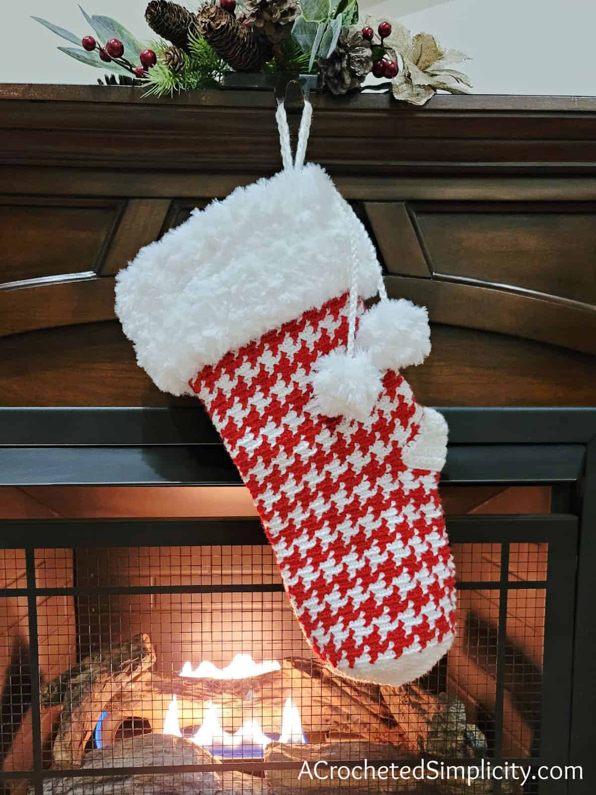 Free Crochet Stocking Pattern - Houndstooth Christmas Stocking by A Crocheted Simplicity #crochetcatherineswheel #crochetstocking #plaidstocking #farmhouseplaid #farmhousecrochet #crochetchristmas #crochetchristmasstocking #freecrochetpattern #crochet #handmadestocking #handmadechristmas #houndstooth #classichoundstooth #crochethoundstooth #houndstoothstocking