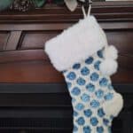 Free Crochet Stocking Pattern - Joyful Textures Christmas Stocking by A Crocheted Simplicity #crochetcatherineswheel #crochetstocking #plaidstocking #farmhouseplaid #farmhousecrochet #crochetchristmas #crochetchristmasstocking #freecrochetpattern #crochet #handmadestocking #handmadechristmas