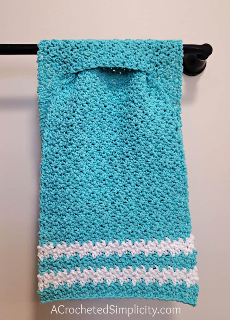 Free Crochet Towel Pattern - Basic Keyhole Kitchen Towel by A Crocheted Simplicity #freecrochetpattern #freecrochettowelpattern #keyhole #keyholetowel #keyholehandtowel #stayputtowel #stayputcrochettowel #keyholetowel #keyholecrochettowel #handmadetowel #crochettowlpattern #crochethandtowel #farmhousekitchentowel #farmhousestripes #crochethandtowel