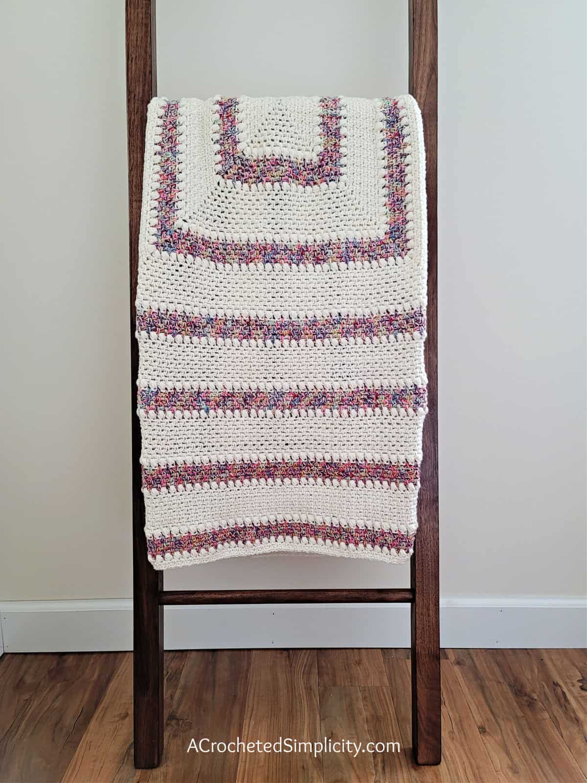 Free Crochet Blanket Pattern - Elayna's Afghan by A Crocheted Simplicity #freecrochetpattern #freecrochetblanketpattern #crochetlapghanpattern #crochetblanketpattern #crochet #crochetlapghan #crochetafghan #crochetpuffstitch #crochetlinenstitch