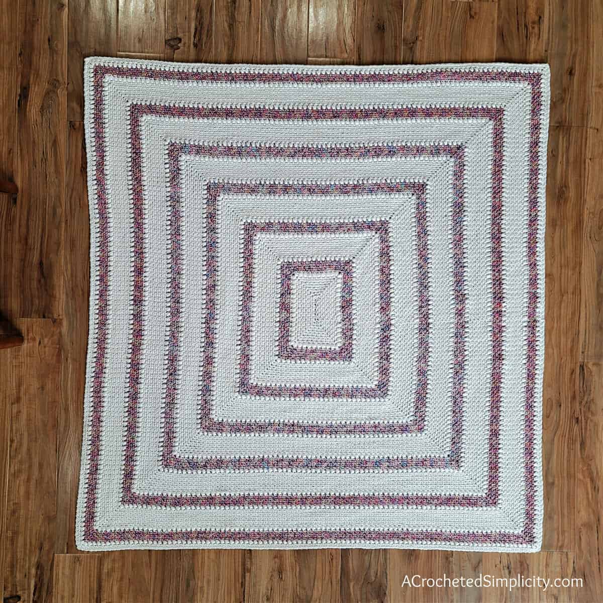 Free Crochet Blanket Pattern - Elayna's Afghan by A Crocheted Simplicity #freecrochetpattern #freecrochetblanketpattern #crochetlapghanpattern #crochetblanketpattern #crochet #crochetlapghan #crochetafghan #crochetpuffstitch #crochetlinenstitch